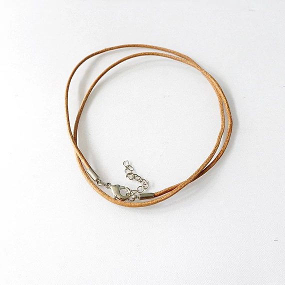 Hengerbőr szál kapoccsal barna