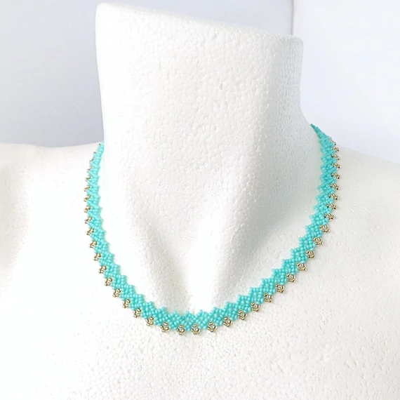 Dupla csipkés gyöngyszalag türkiz színű