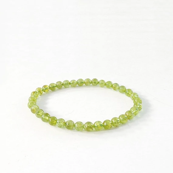 Krizolit (olivin, peridot) karkötő 5,6 mm