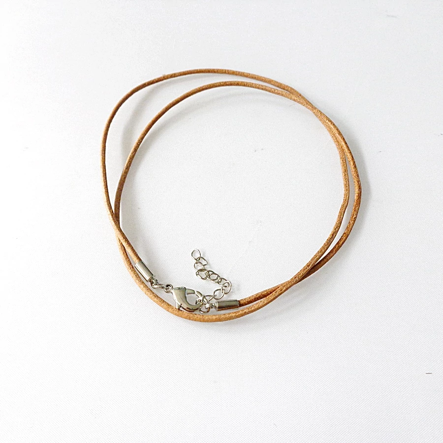 Hengerbőr szál kapoccsal barna