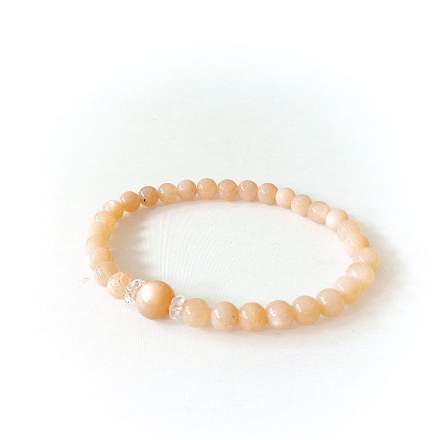 Barna holdkő karkötő hegyikristály koronggal 6 mm